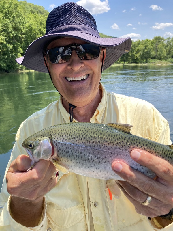 https://www.flyfishersatthecrossing.org/wp-content/uploads/2021/07/ALs_Trout_on-a_dry_fly_White_River.jpeg